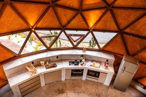 an overhead view of a kitchen in a dome shaped building at Cipó Cabanas in Santana do Riacho