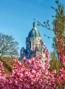 a building with pink flowers in front of it at Greenways House in Lancaster