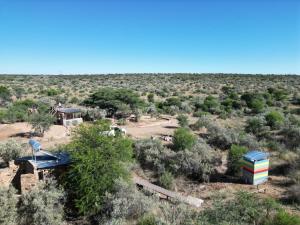 an old building in the middle of the desert at BellaTiny Campsite with camping cabin for 4 in Windhoek +13 photos