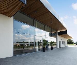 a large glass building with a lot of windows at Camping Terme Catez - Maeva Vacansoleil in Brežice