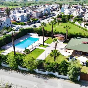 an aerial view of a city with a swimming pool at Katia's Home in Scalea