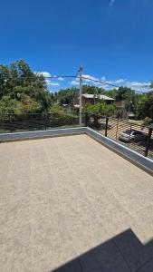 an empty roof with a view of the ocean at Casa 12o - Paso de la Patria in Paso de la Patria