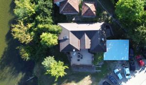 an overhead view of a house with a swimming pool at Riverside Panorama Apartment 1 near City Center Brko 1 in Banja Luka