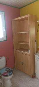a bathroom with a toilet and a sink at Chez NONO in Ruffec +11 photos