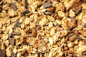 a close up of granola on a table at Tulip Inn Turin South in Moncalieri