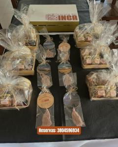 a table with a bunch of packaged food in plastic bags at Hotel Corona del inca in Vinchina