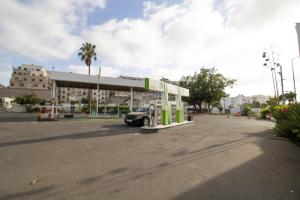 a car is parked at a gas station at Magnificent apartment 10 in Casablanca