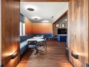 a dining room with a table and some chairs at Pioche Village Park City in Park City