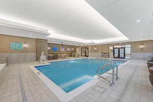 a large swimming pool in a hotel room at Drury Plaza Hotel Lincoln Downtown in Lincoln