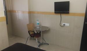 Gallery image of Hotel Abhiruchi Lodging in Hassan +3 photos