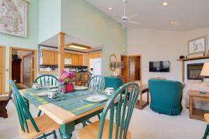 a dining room and living room with a table and chairs at Lake Access w/ Dock! Hayward Cabin Hideaway in Hayward