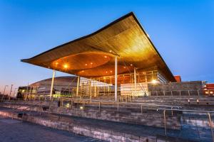 a large building with a wooden roof at night at 3 Bed in Cardiff oc-bow188 in Cardiff