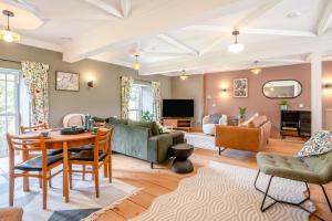 a living room with a couch and a table at 5 Bed in Bwlch oc-p32273 in Bwlch