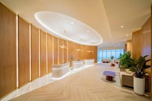 an office lobby with a large circular ceiling at Hyatt Regency Cartagena in Cartagena de Indias