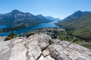 a view of a river from the top of a mountain at Echos and Embers Waterton in Waterton Park +10 photos