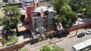 an overhead view of a building on a city street at Pousada Sonho Meu Foz in Foz do Iguaçu