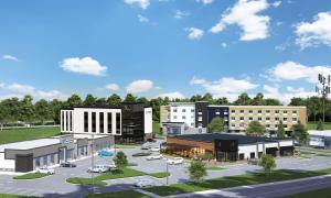 an architectural rendering of a building with a parking lot at XStay Suites Mansfield in Mansfield