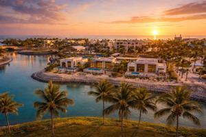 an aerial view of a resort with palm trees at Villa Palmview in Salalah