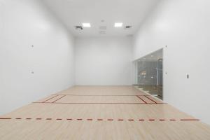an empty room with a wooden floor and a glass door at Stylish Studio in Downtown Location in Miami