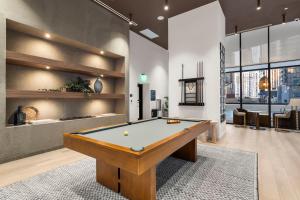 a billiard room with a pool table in it at Stylish Studio in Downtown Location in Miami +19 photos