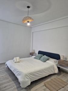 เตียงในห้องที่ SuecaRoom Prime Experience