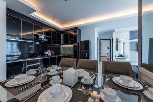 Kuchyň nebo kuchyňský kout v ubytování Naki Suites @ Silvertown