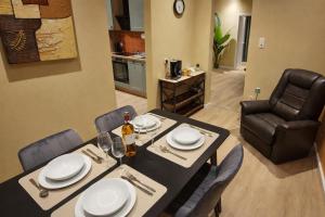 a dining room with a table and chairs at Casa Mateo - Mediterranean Studio in Bielefeld