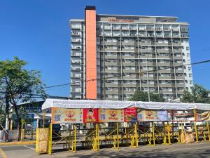 a building with a tent in front of it at LA Condo Staycation at West Jones Residences in Cebu City