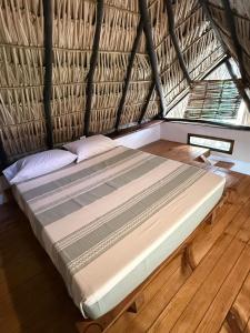 Кровать или кровати в номере Loft Superior con Balcón en Mazunte