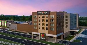a building with a sign on the top of it at Derby City Gaming & Hotel - A Churchill Downs Property in Louisville