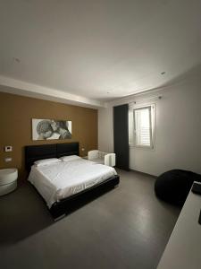 a bedroom with a large bed and a window at Villa Panama con piscina - Mazara del vallo in Mazara del Vallo +21 photos