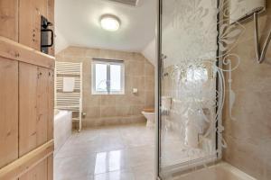 a bathroom with a glass shower and a toilet at 2 Bed in St. Brides oc-k30489 in Saint Brides