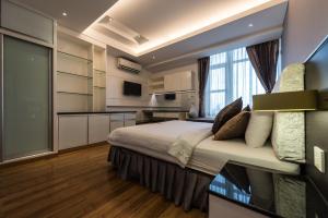 Kuchyň nebo kuchyňský kout v ubytování Naki Suites @ Silvertown