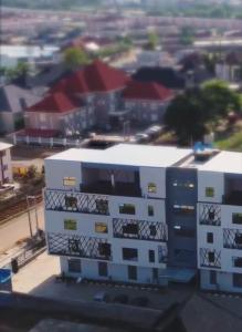 an aerial view of a building in a city at SUITE De PARIS in Abuja
