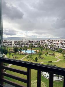a view from the balcony of a resort at Chic studio with balcony, quiet & bright in Tétouan