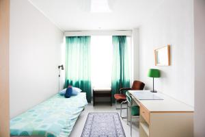 Televízia a/alebo spoločenská miestnosť v ubytovaní Bed&Breakfast Tuure