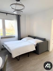 Llit o llits en una habitació de Apartment4