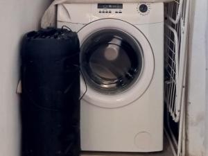a washer and dryer sitting in a room at La Marita in Gualeguay