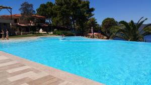 Бассейн в Residence Cala Silente или поблизости