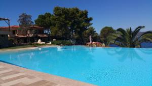 Бассейн в Residence Cala Silente или поблизости