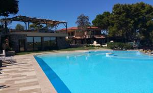 Бассейн в Residence Cala Silente или поблизости