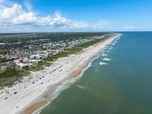 an aerial view of a beach with people on it at Spanish Trace 235 in St. Augustine