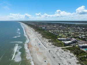 an aerial view of a beach and the ocean at Spanish Trace 235 in St. Augustine