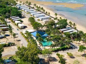an aerial view of the resort and the beach at Tasman Holiday Parks - Rollingstone in Rollingstone