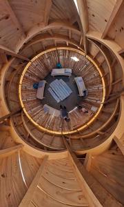 an overhead view of a round room in a wooden cabin at Yurtas Patagónicas Refugio de estepa in Bajo Caracoles