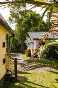 a house with a gate next to a driveway at BIG4 Tasman Holiday Parks - South Mission Beach in South Mission Beach