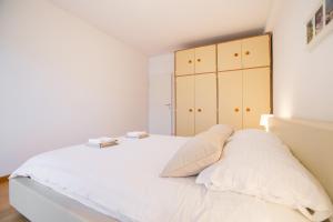 Posteľ alebo postele v izbe v ubytovaní Apartman Kris