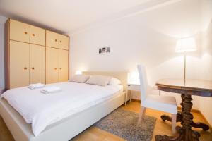 Posteľ alebo postele v izbe v ubytovaní Apartman Kris