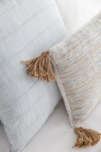 a close up of a pillow with aafia at Lavender & Olive in Myrtleford