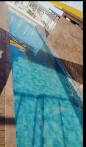 a close up of a swimming pool at Apt 1012 Conforto aconchego e vibe acolhedora in Santa Maria
